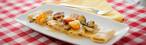 accheri Napoletani 80 with clams, confit tomatoes and cannellini beans Divella